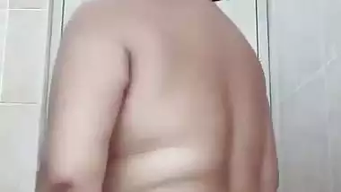 Hot milf shows her big boobs and ass on camera