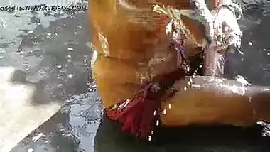 Indian Bhabhi Taking A Nice Open Bath
